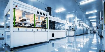 Maatwerkmachines-in-serieproductie-image Maatwerkmachines in een futuristische hal